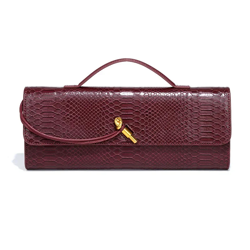 Riviera Rouge – Elegant croco clutch with gold clasp 