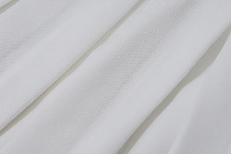 Le Blanc Chic Set - Minirock & V-Ausschnitt Weste